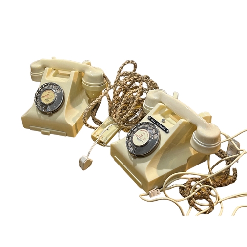 51B - TWO TYPE 232 SERIES WHITE TELEPHONES
Impressed and marked, one having exchange list drawer, both hav... 