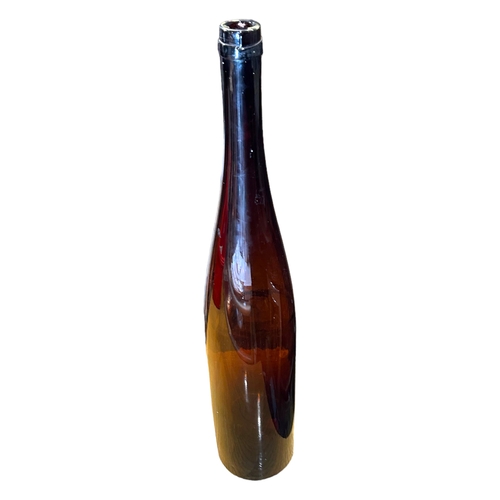 53B - AN EXTREMELY LARGE VINTAGE BROWN GLASS BOTTLE VASE. 
(h 77cm)