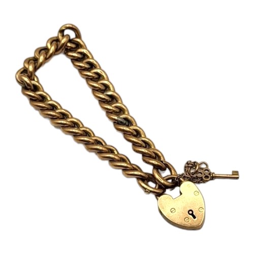 4A - AN EDWARDIAN 9CT GOLD GATE LINK BRACELET
Having chased and engraved heart padlock clasp, links havin... 