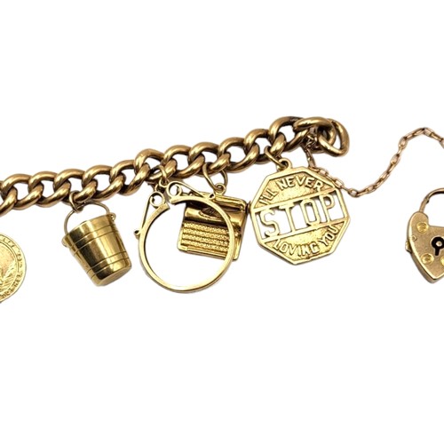 1A - A VINTAGE 9CT GOLD CURB LINK CHARM BRACELET AND CHARMS
Having heart shaped padlock clasp, charms com... 