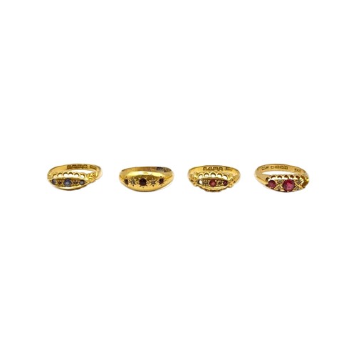 41A - AN EARLY 20TH CENTURY 18CT YELLOW GOLD, DIAMOND AND GARNET GYPSY SET RING. TOGETHER WITH THREE 18CT ... 