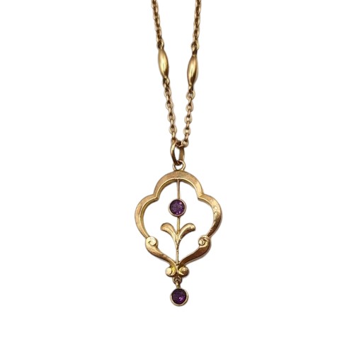 43A - AN EDWARDIAN ART NOUVEAU 10CT GOLD AND AMETHYST PENDANT, TOGETHER WITH 9CT GOLD CHAIN. 
(length 44.2... 