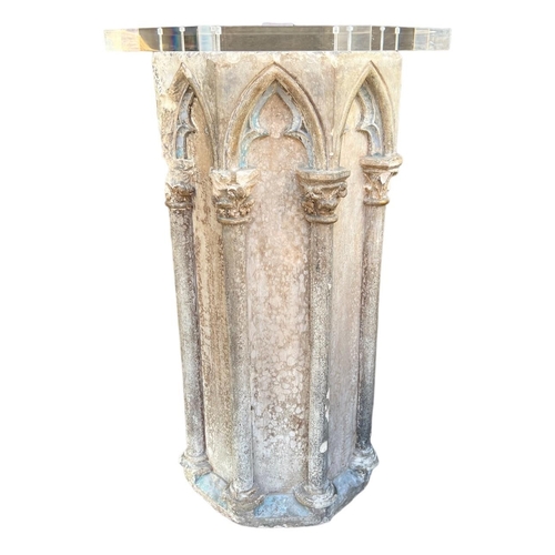 203 - A PAIR OF 16TH CENTURY OCTAGONAL CARVED LIMESTONE COLUMNSEach with eight Gothic-arched niches, decor... 