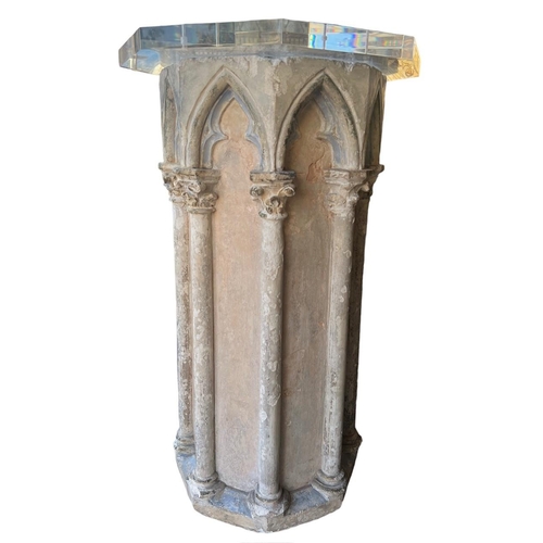 203 - A PAIR OF 16TH CENTURY OCTAGONAL CARVED LIMESTONE COLUMNSEach with eight Gothic-arched niches, decor... 