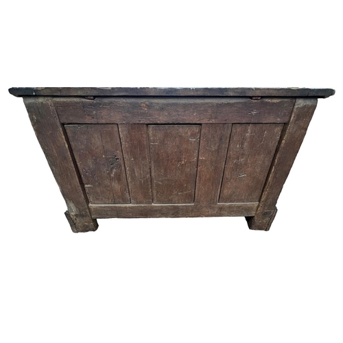 207 - A 16TH CENTURY FRENCH, OAK COFFER with hinged lid above carved freeze decorated with swags and mount... 