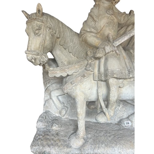 213 - A LARGE RARE EARLY 16TH CENTURY FRENCH CARVED LIMESTONE GROUP, St. Martin on horseback sharing a clo... 