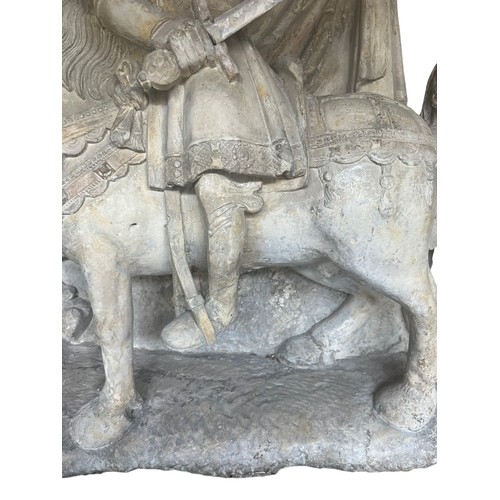 213 - A LARGE RARE EARLY 16TH CENTURY FRENCH CARVED LIMESTONE GROUP, St. Martin on horseback sharing a clo... 