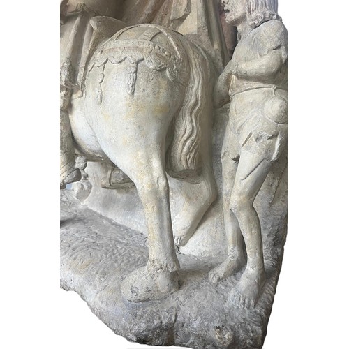 213 - A LARGE RARE EARLY 16TH CENTURY FRENCH CARVED LIMESTONE GROUP, St. Martin on horseback sharing a clo... 