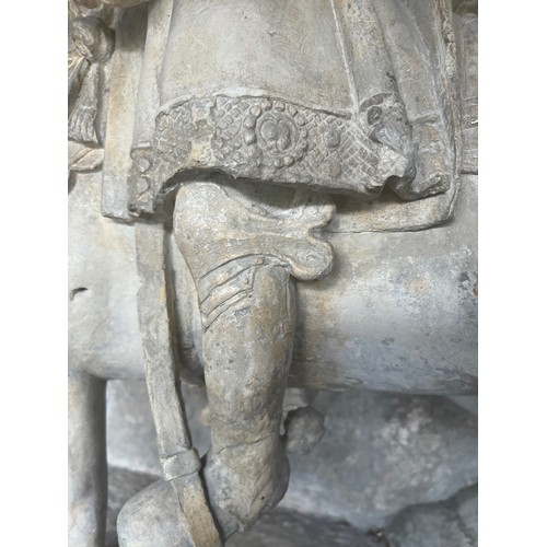 213 - A LARGE RARE EARLY 16TH CENTURY FRENCH CARVED LIMESTONE GROUP, St. Martin on horseback sharing a clo... 