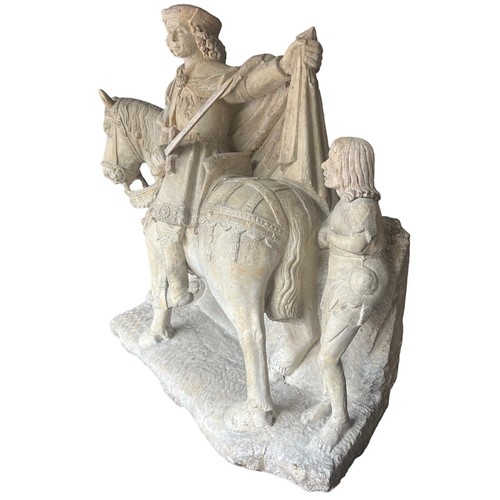 213 - A LARGE RARE EARLY 16TH CENTURY FRENCH CARVED LIMESTONE GROUP, St. Martin on horseback sharing a clo... 