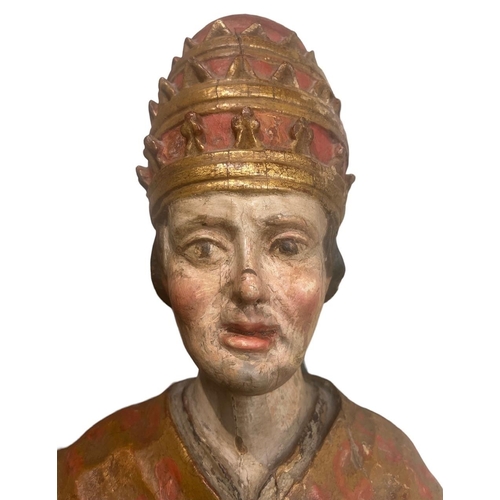 215 - A LARGE 16TH/17TH CENTURY CARVED WOOD POLYCHROME AND GILDED STATUE OF A POPEWearing the triple tiara... 