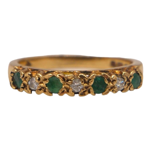 10 - A 9CT GOLD, SEVEN STONE EMERALD & DIAMOND RING. Three brilliant round cut diamonds (approx. diameter... 