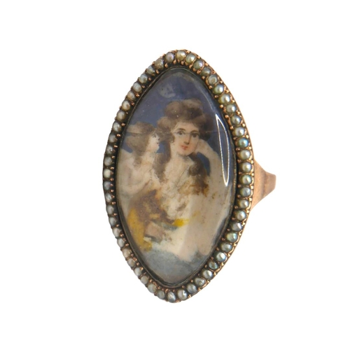 15 - A GEORGIAN ROSE METAL AND SEED PEARL PORTRAIT RING (TESTED AS 14CT ROSE GOLD) Lozenge shaped front h... 