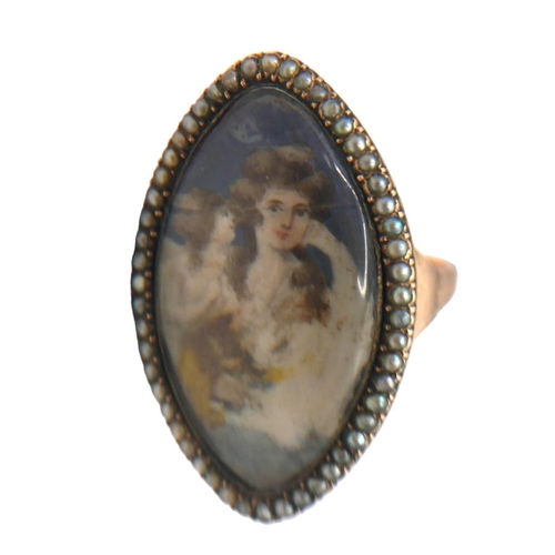 15 - A GEORGIAN ROSE METAL AND SEED PEARL PORTRAIT RING (TESTED AS 14CT ROSE GOLD) Lozenge shaped front h... 