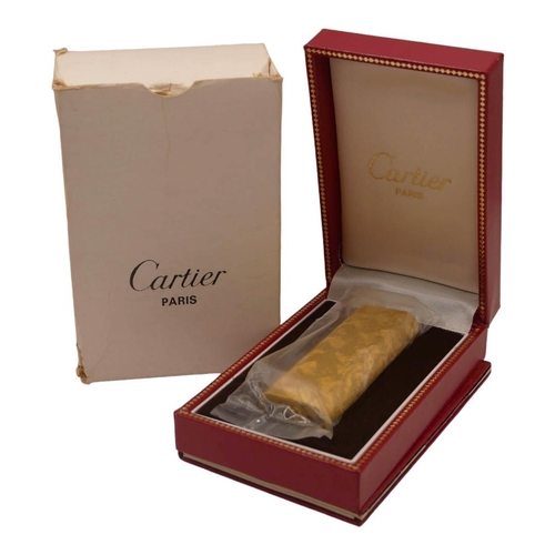 22 - CARTIER, A VINTAGE GOLD PLATED LIGHTER, UNOPENED CELLOPHANE
Housed in a box, complete with paperwork... 