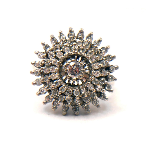 27 - A VINTAGE 18CT WHITE GOLD AND DIAMOND CLUSTER RING
Three tiered round cut diamond halo (approx diame... 