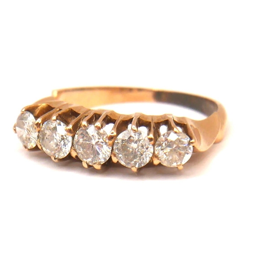 33 - A VINTAGE YELLOW METAL AND FIVE STONE DIAMOND RING (YELLOW METAL TESTED AS 14CT YELLOW GOLD)
Five gr... 