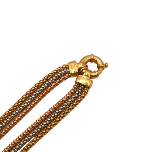 36 - VINTAGE DESIGNER STYLE 18CT GOLD TRICOLOURED NECKLACE
Having three strand yellow, white and rose col... 