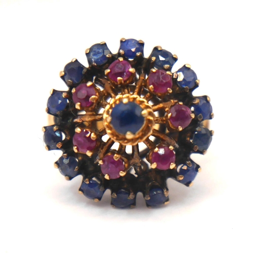 48 - A 14CT YELLOW GOLD, SAPHIRE AND RUBY CLUSTER RING
Two tier halo of sapphires and rubies, surmounted ... 