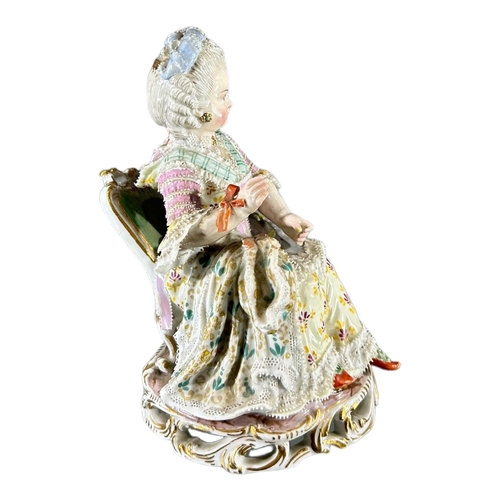 104 - MEISSEN, AN 18TH CENTURY GERMAN PORCELAIN FIGURE, TITLED ‘GIRL WITH YARN’, MODELLED BY MICHEL VICTOR... 