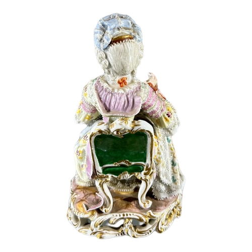 104 - MEISSEN, AN 18TH CENTURY GERMAN PORCELAIN FIGURE, TITLED ‘GIRL WITH YARN’, MODELLED BY MICHEL VICTOR... 