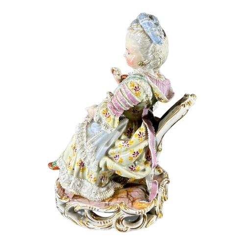 104 - MEISSEN, AN 18TH CENTURY GERMAN PORCELAIN FIGURE, TITLED ‘GIRL WITH YARN’, MODELLED BY MICHEL VICTOR... 