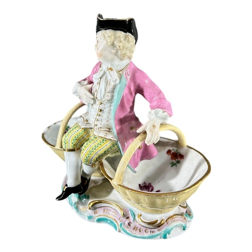 105 - MEISSEN, AN 18TH CENTURY GERMAN PORCELAIN SALT & PEPPER DISH STYLISED WITH FIGURE, MODELLED BY JOHAN... 