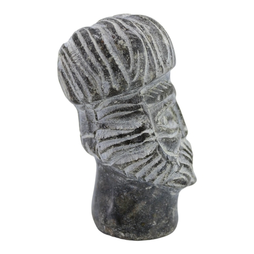 106A - AFTER SASSANIAN, IRAN, A CARVED SOAPSTONE BUST OF A MAN, POSSIBLY A KING. (h 7.9cm x w 4.2cm x d 5cm... 