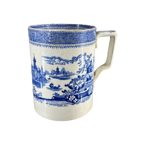 113 - A LARGE 19TH CENTURY BLUE AND WHITE QUARTER GALLON TANKARDDecorated with Mausoleum garden landscape ... 