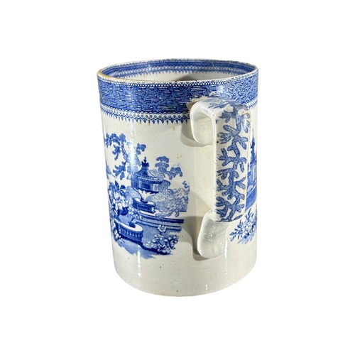 113 - A LARGE 19TH CENTURY BLUE AND WHITE QUARTER GALLON TANKARDDecorated with Mausoleum garden landscape ... 