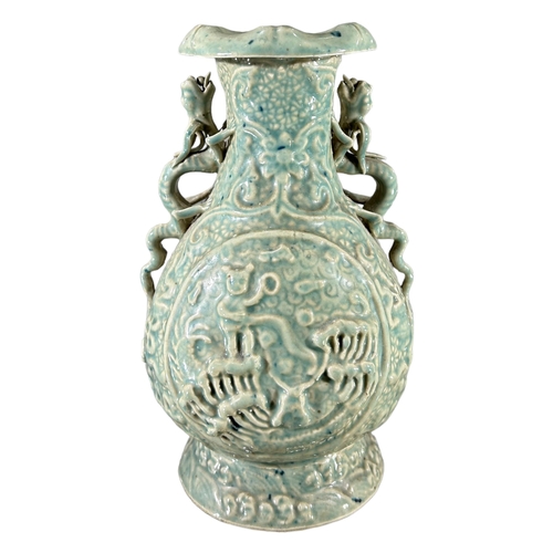 132 - A 19TH CENTURY CHINESE QING DYNASTY CELADON VASE, BEARING QIANLONG MARK TO BASETwo circular panels, ... 