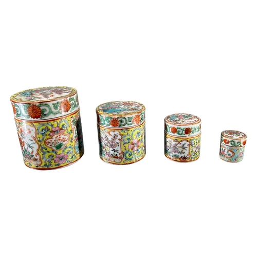 135 - COLLECTION OF FOUR 19TH CENTURY CHINESE FAMILLE JAUNE CYLINDRICAL JARS AND COVERSEach decorated exte... 