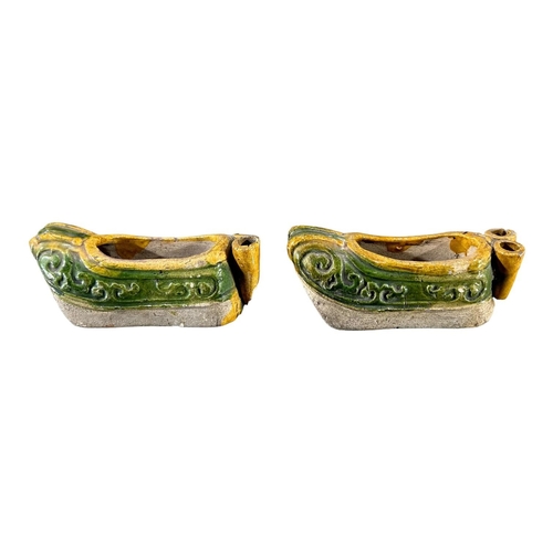 141 - PAIR OF 19TH CENTURY CHINESE QING DYNASTY SANCAI GLAZED SHOESEarthen greens and browns. (h 4.5cm x w... 