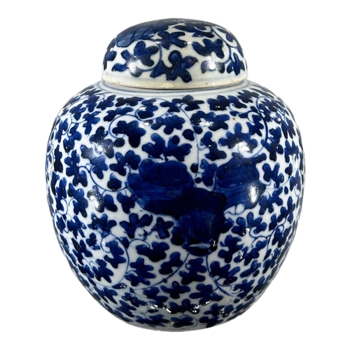 154A - A CHINESE KANGXI BLUE AND WHITE LOTUS GINGER JARDecorated with underglaze blue with large lotus bloo... 