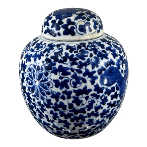 154A - A CHINESE KANGXI BLUE AND WHITE LOTUS GINGER JARDecorated with underglaze blue with large lotus bloo... 