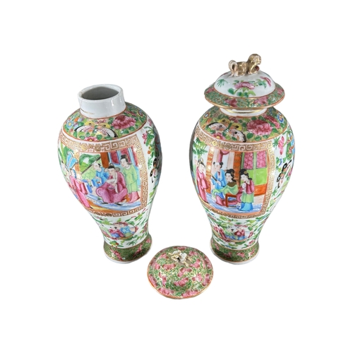 159 - TWO EARLY 19TH CENTURY CHINESE CANTON FAMILLE ROSE VASESDecorated with multiples panels showing cour... 