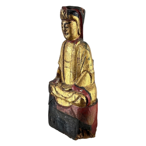 161A - A CHINESE QING DYNASTY CARVED POLYCHROME FIGURE, POSSIBLY GUANYINShowing a seated individual on thro... 