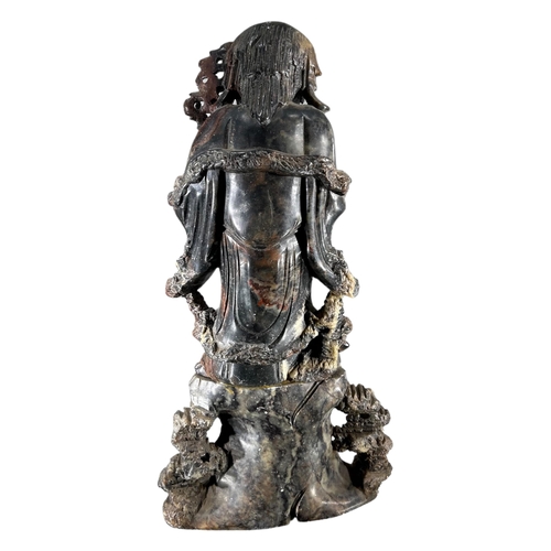 165 - A LARGE CHINESE LATE QING DYNASTY CARVED SOAPSTONE FIGURE OF LI TIEGUAI, ONE OF THE EIGHT IMMORTALS.... 