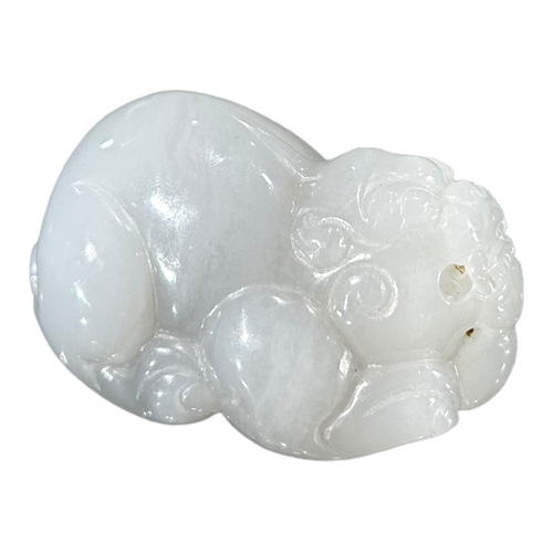 168 - A CHINESE WHITE JADE CARVING OF A MYTHICAL QILINRecumbent position. (h 4cm x w 6.9cm x d 3.6cm)