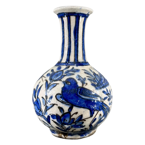 174 - SAFAVID, PERSIA, A LATE 17TH CENTURY / EARLY 18TH CENTURY BLUE AND WHITE BOTTLE VASEDecorated with b... 