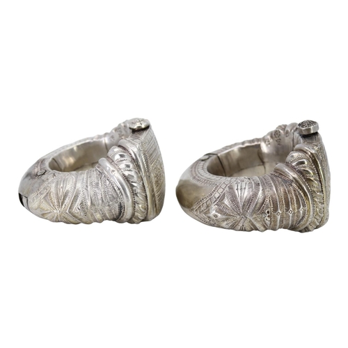 56 - A LARGE PAIR OF 19TH CENTURY ISLAMIC OMANI SILVER ANKLETS (PROBABLY FROM NIZWA, OMAN)
Decorated with... 