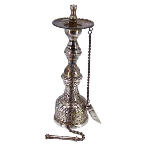 60 - A 20TH CENTURY EGYPTIAN SILVER MINIATURE HOOKAH
Having chased and engraved floral decoration. 
(h 16... 