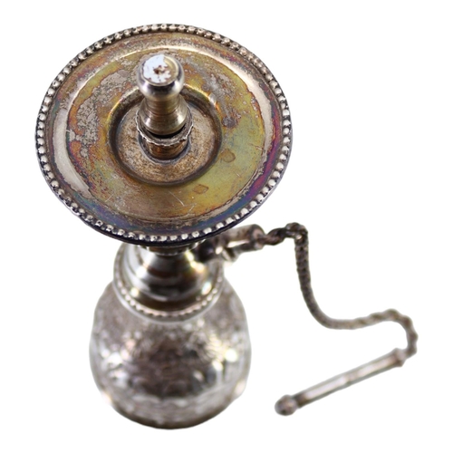 60 - A 20TH CENTURY EGYPTIAN SILVER MINIATURE HOOKAH
Having chased and engraved floral decoration. 
(h 16... 