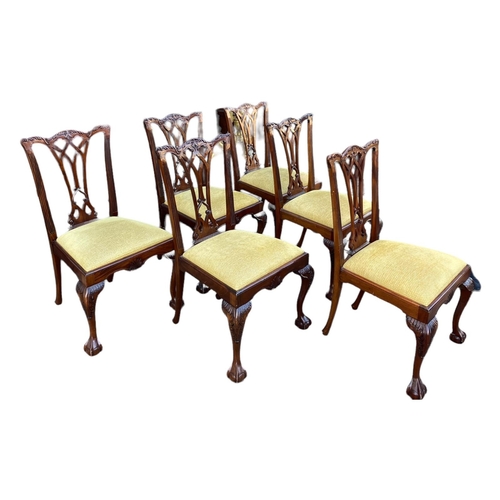 229 - A SET OF SIX GEORGE III DESIGN CARVED MAHOGANY DINING CHAIRSThe priced backs above drop in upholster... 