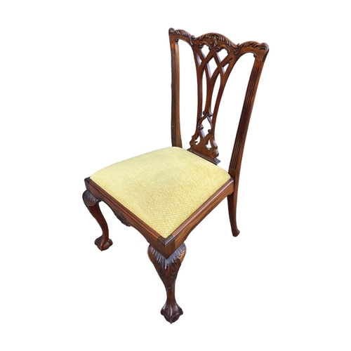 229 - A SET OF SIX GEORGE III DESIGN CARVED MAHOGANY DINING CHAIRSThe priced backs above drop in upholster... 