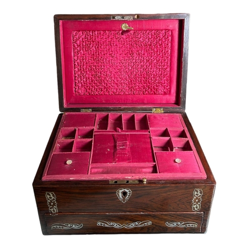 114A - A VICTORIAN ROSEWOOD SEWING AND WRITING BOXHaving Mother of pearl inlay and pink satin lined interio... 