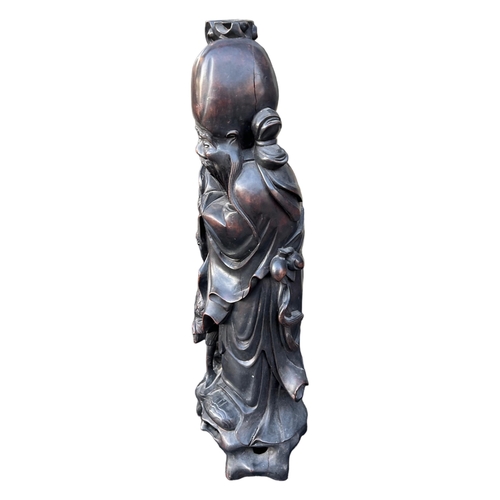 161 - A LARGE CHINESE LATE QING DYNASTY CARVED HARDWOOD FIGURE OF SHOUXING, ONE OF THE EIGHT IMMORTALS. (h... 