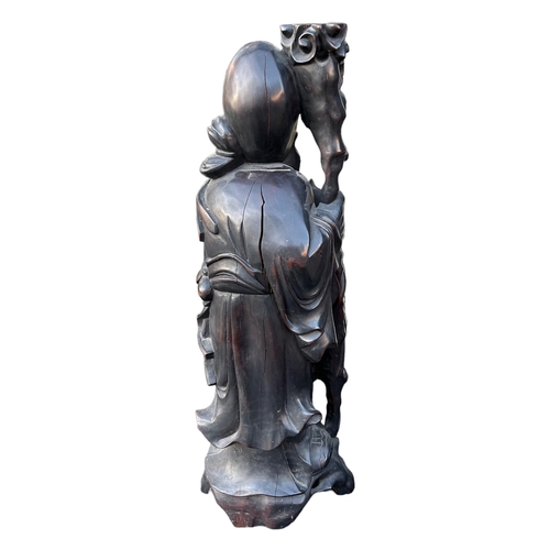 161 - A LARGE CHINESE LATE QING DYNASTY CARVED HARDWOOD FIGURE OF SHOUXING, ONE OF THE EIGHT IMMORTALS. (h... 