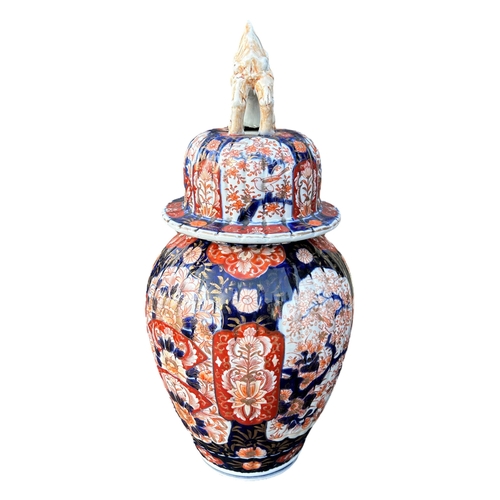 162 - A LARGE 19TH CENTURY JAPANESE MEIJI PERIOD IMARI PORCELAIN TEMPLE JAR AND COVERDecorated extensively... 