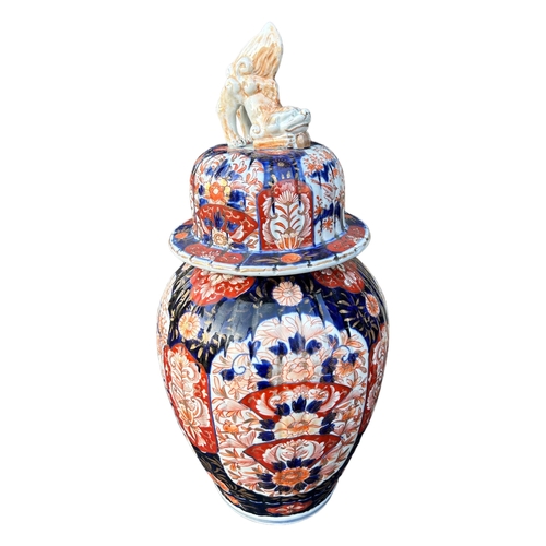 162 - A LARGE 19TH CENTURY JAPANESE MEIJI PERIOD IMARI PORCELAIN TEMPLE JAR AND COVERDecorated extensively... 